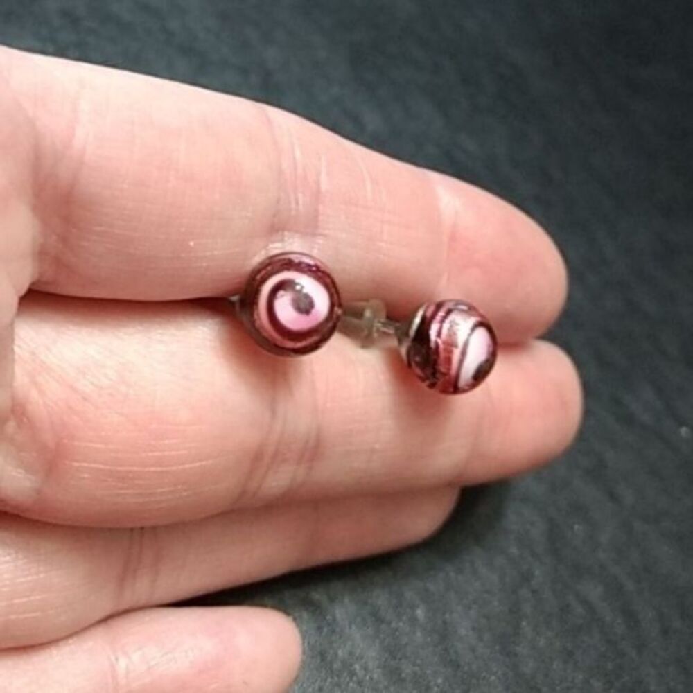 Round pink swirly earrings